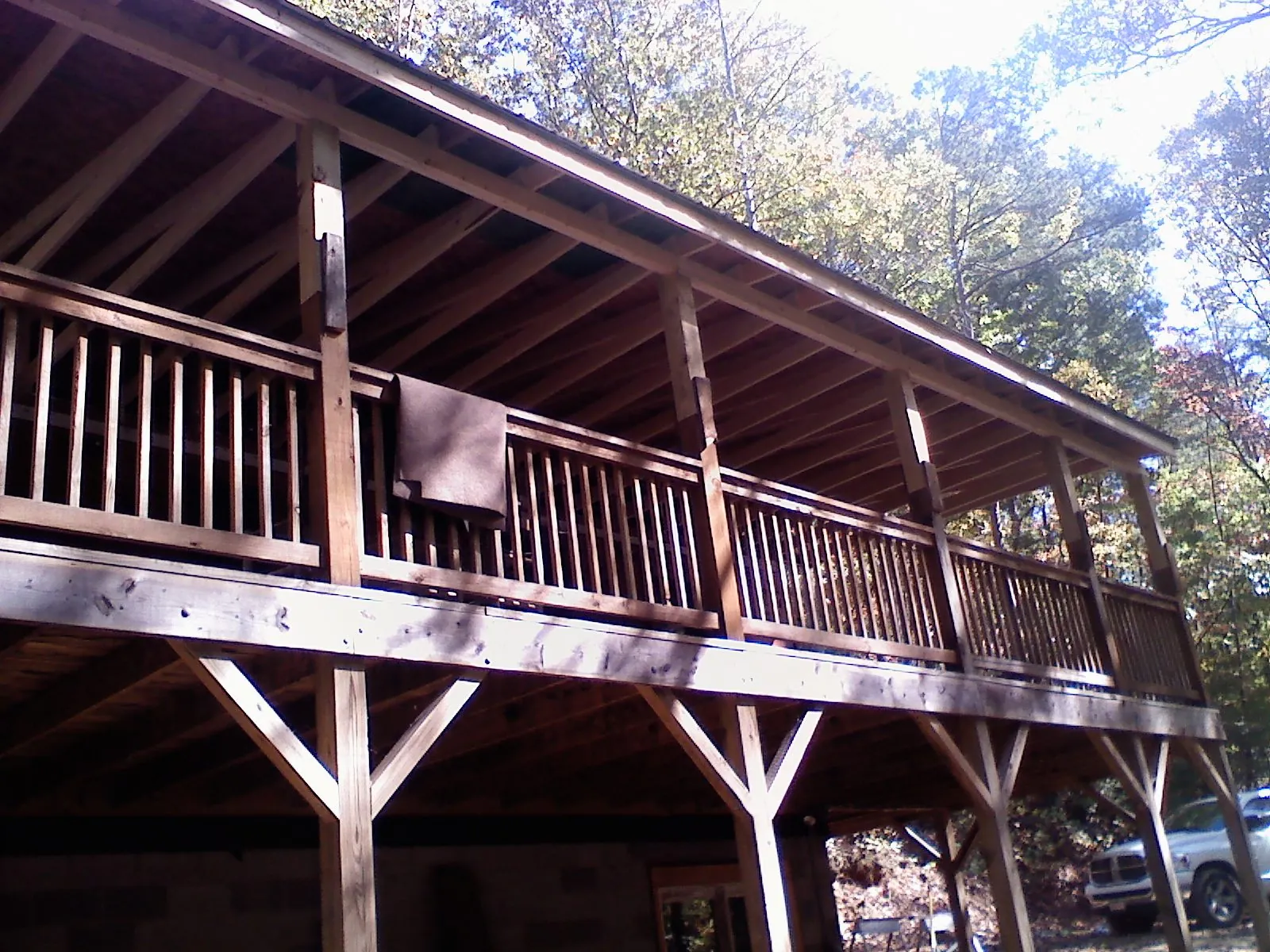 Timber framing under a new elevated porch and deck — Roof Leak Repair in Collinsville by Roofing Brothers